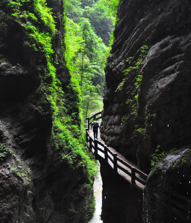 Cliffside walkway and waterfall in Longshuixia Gap Wulong